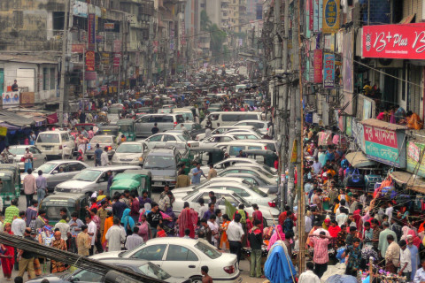 Dhaka (Bangladesh) traffic has been called one of the 7 wonders of the modern world. To be fair, this is a street adjacent to New Market and isn't really a normal traffic road. For example, rickshaws are prohibited. Bangladesh has been promoting the use of natural gas (CNG) for over a decade resulting in significant reduction in smog.